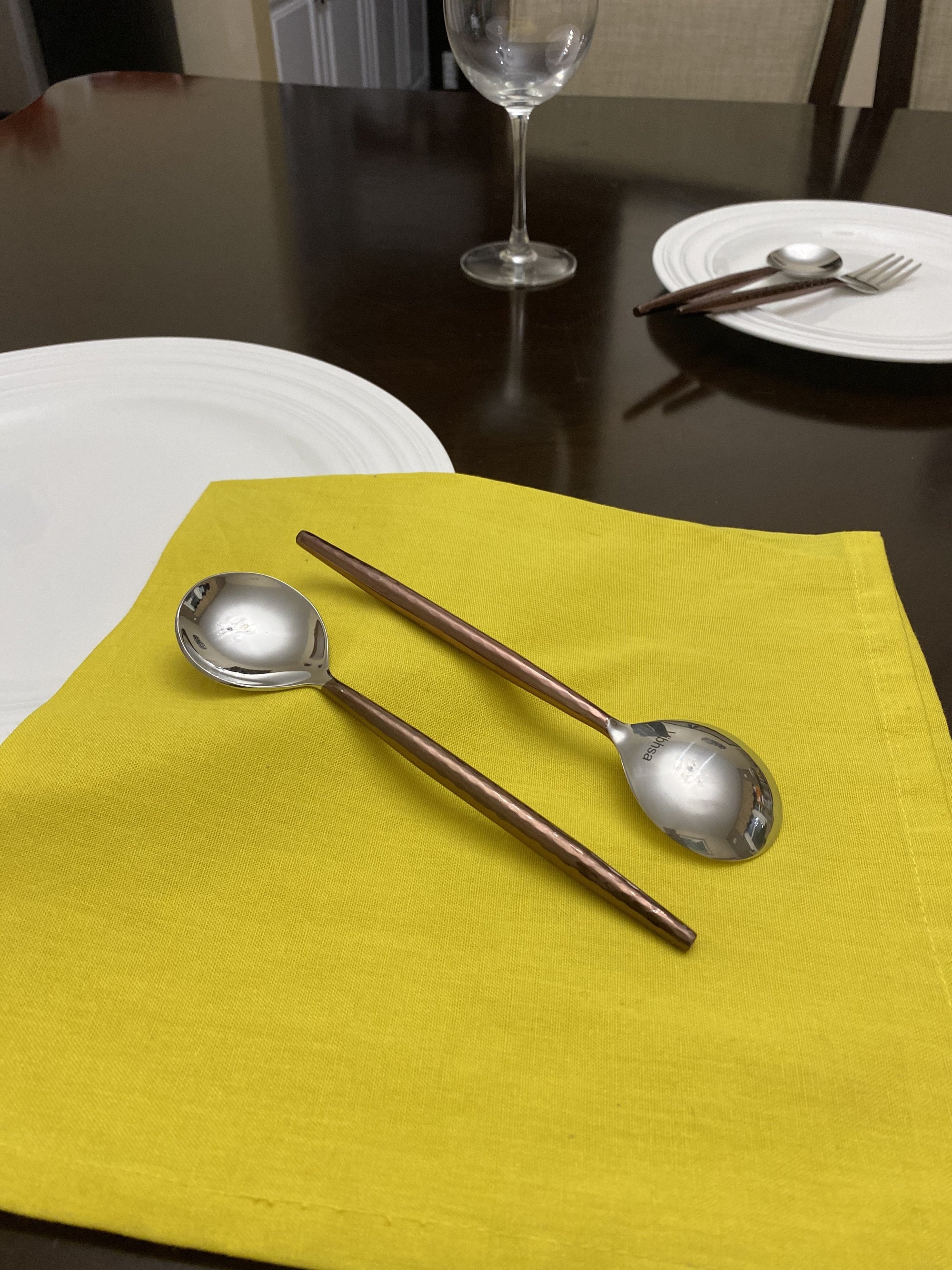 Set of six brown hammered handle stainless steel soup spoons by Vibhsa