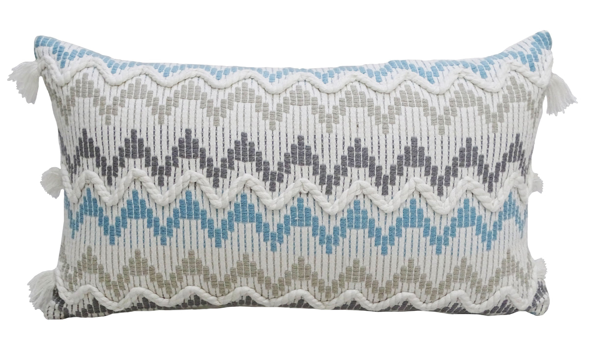 Chevron Throw Pillow 14x24 inches with braid and tassels on sofa