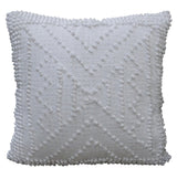 White 18x18 decorative outdoor pillow displayed on a couch