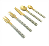 Set of five gold-toned stainless steel flatware pieces with textured, twisted silver handles, including forks, knife, and spoons arranged on a white background.