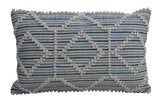 Rectangular handwoven throw pillow with horizontal blue and white stripes and raised cream diamond pattern, edged with small cream tassels.