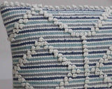 Handwoven 14x24 inch throw pillow with horizontal blue, teal, and white stripes and white textured geometric patterns.