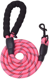 Coiled thick red and black reflective dog leash with a padded black handle and metal clasp at the end for attachment.
