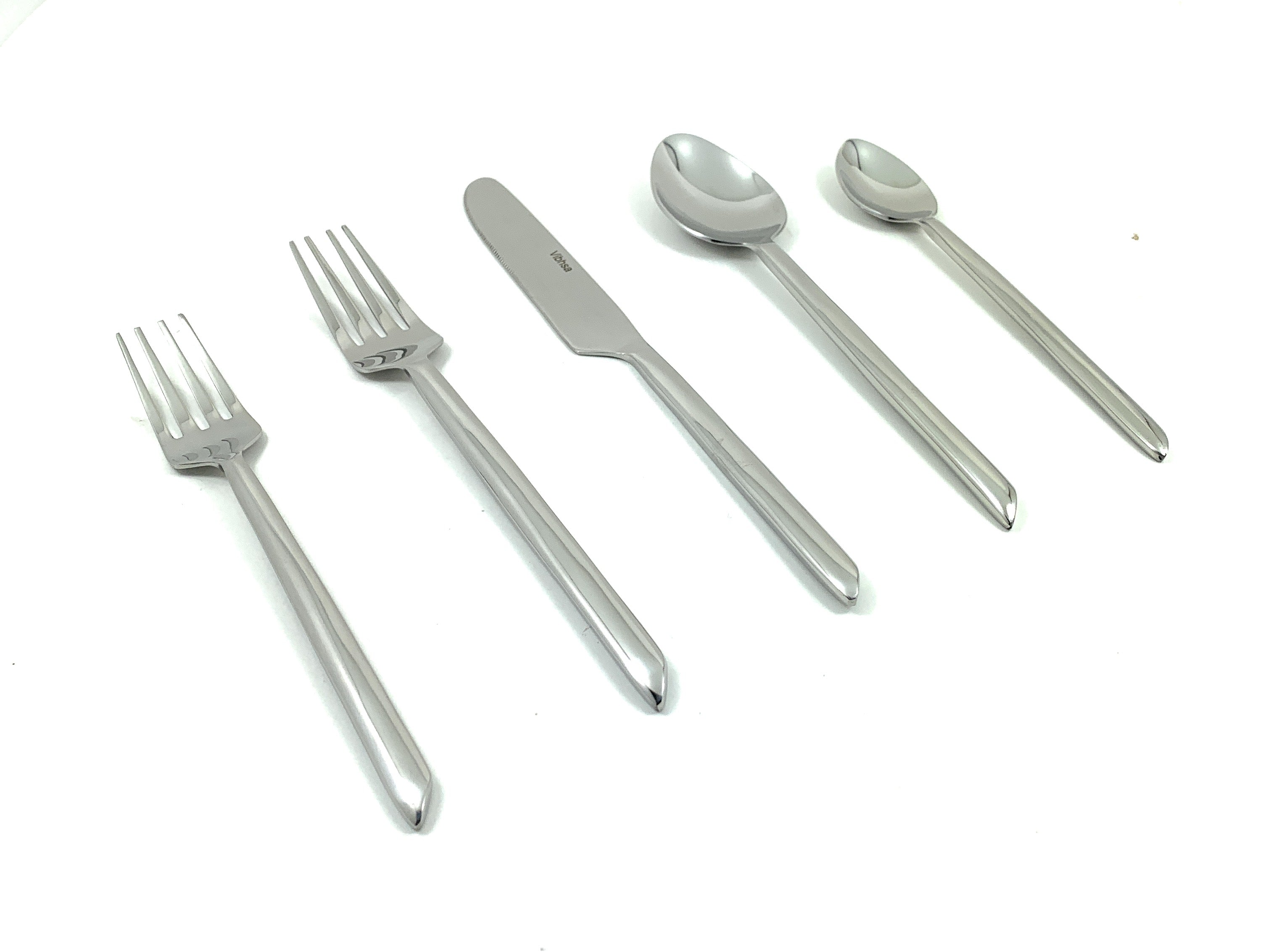 Set of 20 silver flatware pieces including forks, knives, tablespoons, teaspoons, and salad forks with sleek handles