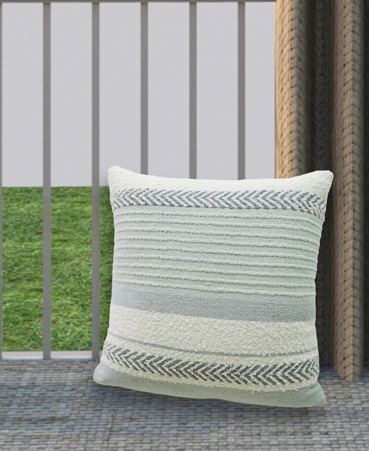 Square handloom woven pillow featuring horizontal stripes in varying shades of light gray and white with textured chevron patterns near top and bottom edges.