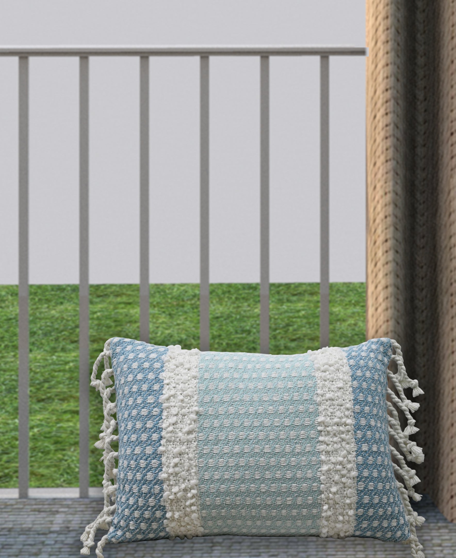 Handwoven Buttknot Edging Decorative Pillow in neutral tones showing textured fabric and knotted edges