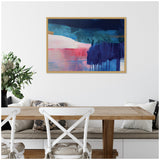 Abstract canvas wall art with bold horizontal blocks of navy, teal, pink, and white, with drips and textured brushstrokes in a light wood frame.
