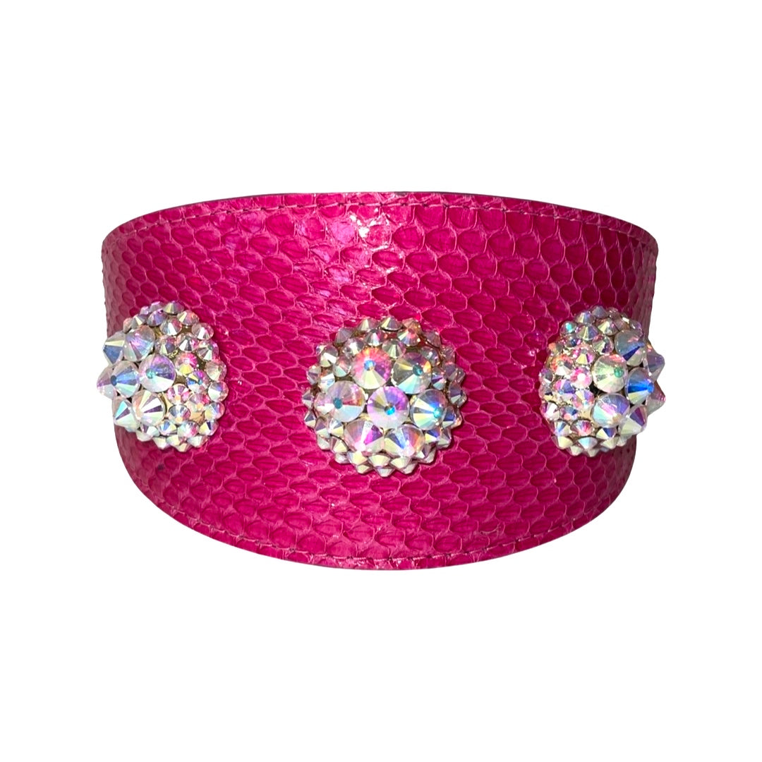 Wide fuchsia collar with a snake skin texture, adorned with three round clusters of custom iridescent Swarovski crystal rivets evenly spaced across its surface.