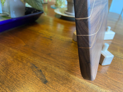 Walnut charcuterie board with cherry and maple decorative banding by Fitzgerald Custom Woodcraft