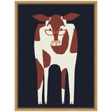 Simplified brown and white cow wearing red glasses on a dark navy background, framed with a light wooden frame in a minimalist style.