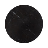 Round black marble tabletop with subtle white veining and a polished smooth surface, viewed from above.