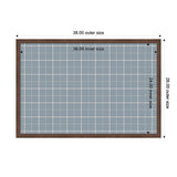 Rectangular light blue fabric pinboard with a white grid pattern, encased in a dark wooden frame showing outer and inner dimensions.