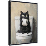 Framed canvas artwork of a black cat with a toilet paper roll on a bathroom wall