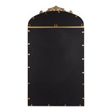 Arched top mirror with a decorative gold crest and multiple gold clips securing its black reflective surface within the frame.