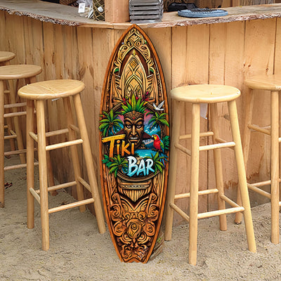 Tiki Bar Surfboard Wall Art featuring a tiki mask, palm trees, tropical sunset, and parrot