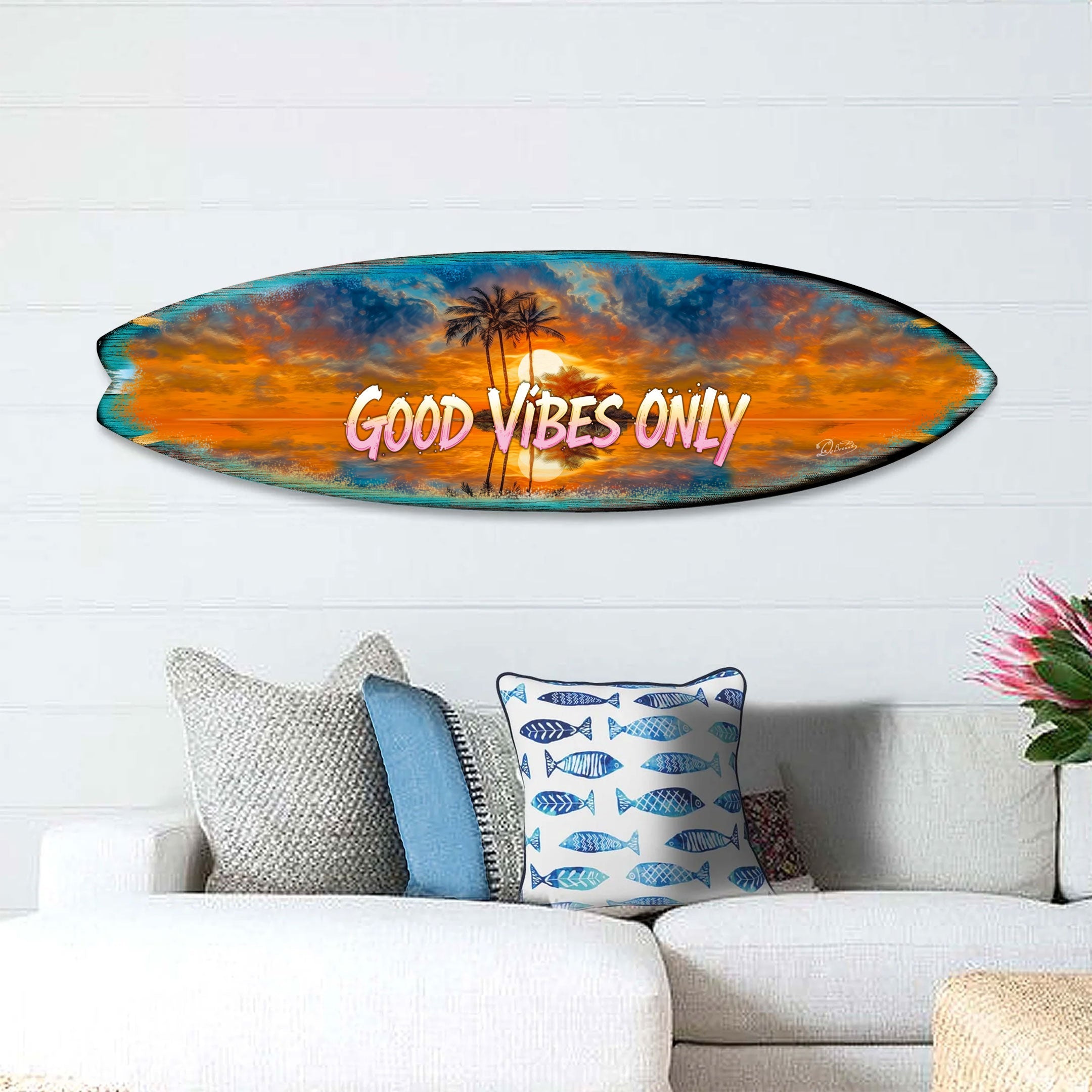 Surfboard shaped wall art with sunset, palm trees, and 'Good Vibes Only' lettering