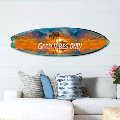 Surfboard shaped wall art with sunset, palm trees, and 'Good Vibes Only' lettering