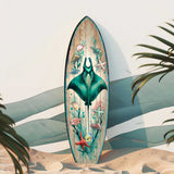 Manta Ray Surfboard Wall Art showing a manta ray, sea creatures, coral, and reef fish on birch wood