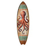 Wood-toned surfboard with a red octopus painted in the center, decorated with tribal patterns and green geometric bands at top and bottom edges.