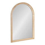 Arch-shaped wall mirror with a smooth, light wood frame featuring natural grain and a rounded top, reflecting a neutral, light background.