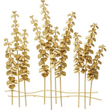 Wall-mounted coat rack with golden branches and leaf motifs against a white wall