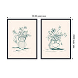 Two framed canvas prints each with a line-drawn floral arrangement in teal on cream background; left shows a ribbed pitcher with flowers, right a footed vase with blossoms.