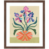 Abstract floral artwork featuring three multicolored iris flowers with layered petals in shades of pink, purple, and blue emerging from a striped coral and teal rounded vase, set against a beige and light green background framed.