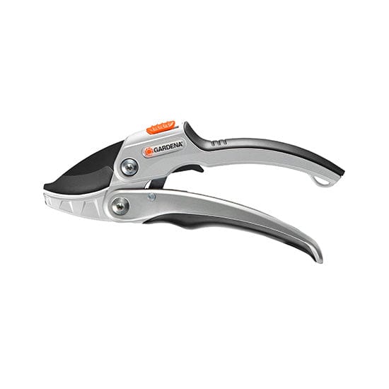 Ratchet Secateurs SmartCut Comfort hand tool by Gardena positioned on a natural wood surface.