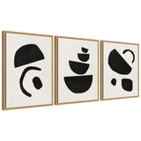Set of three framed abstract canvas prints featuring minimalist black geometric shapes on a light beige background with wooden frames