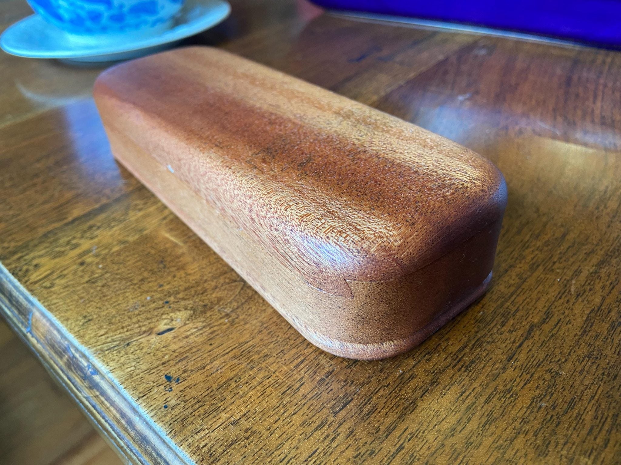 Handcrafted mahogany keepsake box with sliding dovetail joinery and beaded bottom detail