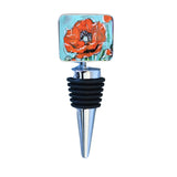 Close-up of the Wine Bottle Stopper: Poppy showing zinc-alloy decorative top with floral poppy artwork and stainless steel base