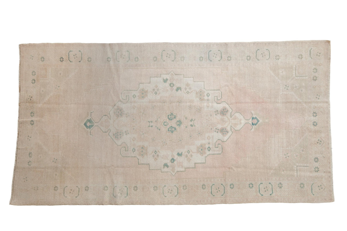 4x8 Vintage Distressed Oushak Rug Runner in muted tones featuring concentric medallions and floral buds