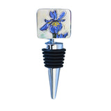 Wine Bottle Stopper: Purple Iris featuring floral artwork atop a stainless steel base with silicone sealing rings.