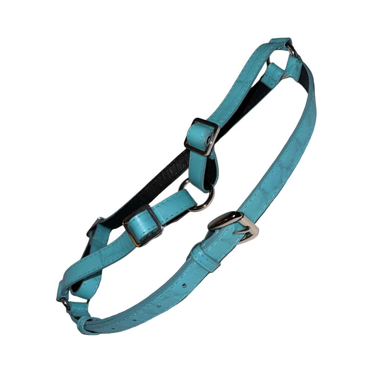 Turquoise blue leather harness with embossed crocodile pattern and silver metal hardware, displayed isolated on a white background.