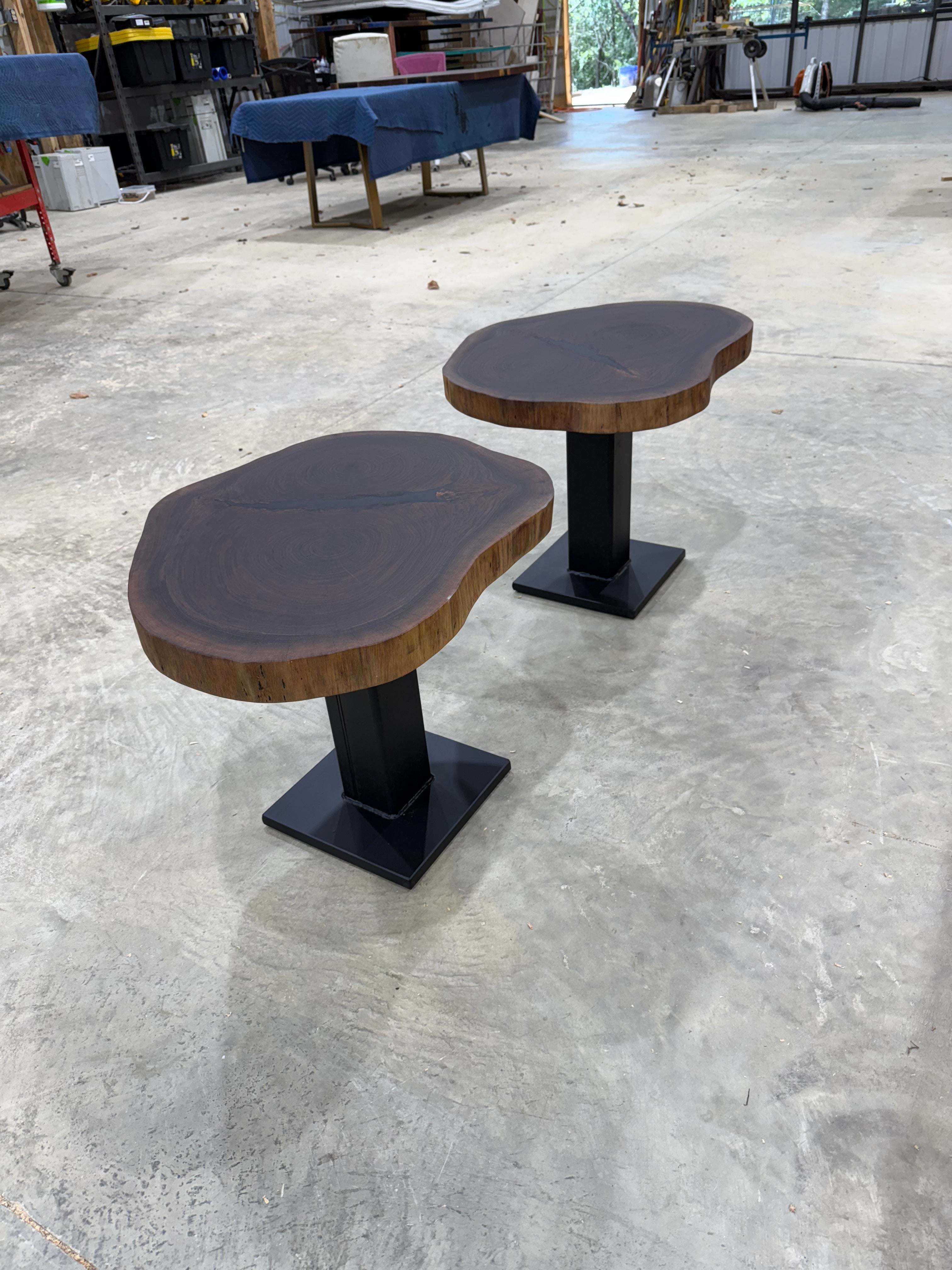 Walnut Cookie Side Tables with thick steel bases, handcrafted by Sasquatch Tables LLC