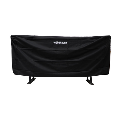 Woodhaven 8 ft Large Crescent Firewood Rack with seasoning cover holding firewood outside a house