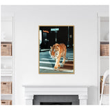 Framed canvas showing a tiger walking on a city crosswalk at night with illuminated storefronts in the background.