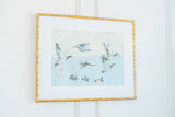 Taking Off Mallard Ducks fine art print by Chelsea McShane Art, featuring mallard ducks taking flight over marshland.
