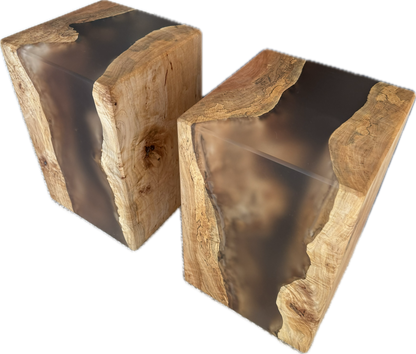 Two wooden side tables with a natural maple finish and epoxy accents on a white background