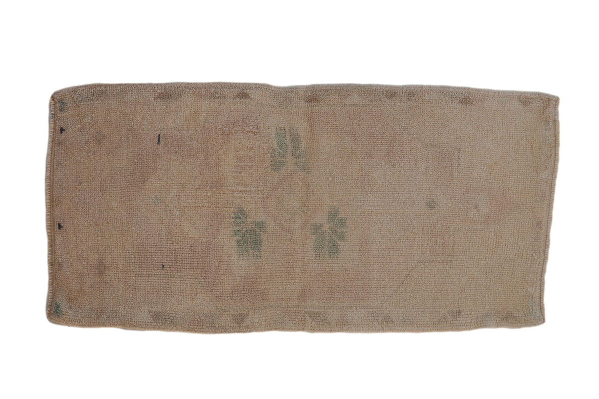 Vintage distressed Oushak rug mat runner with floral medallion in beige, sand, seafoam green, and mauve tones