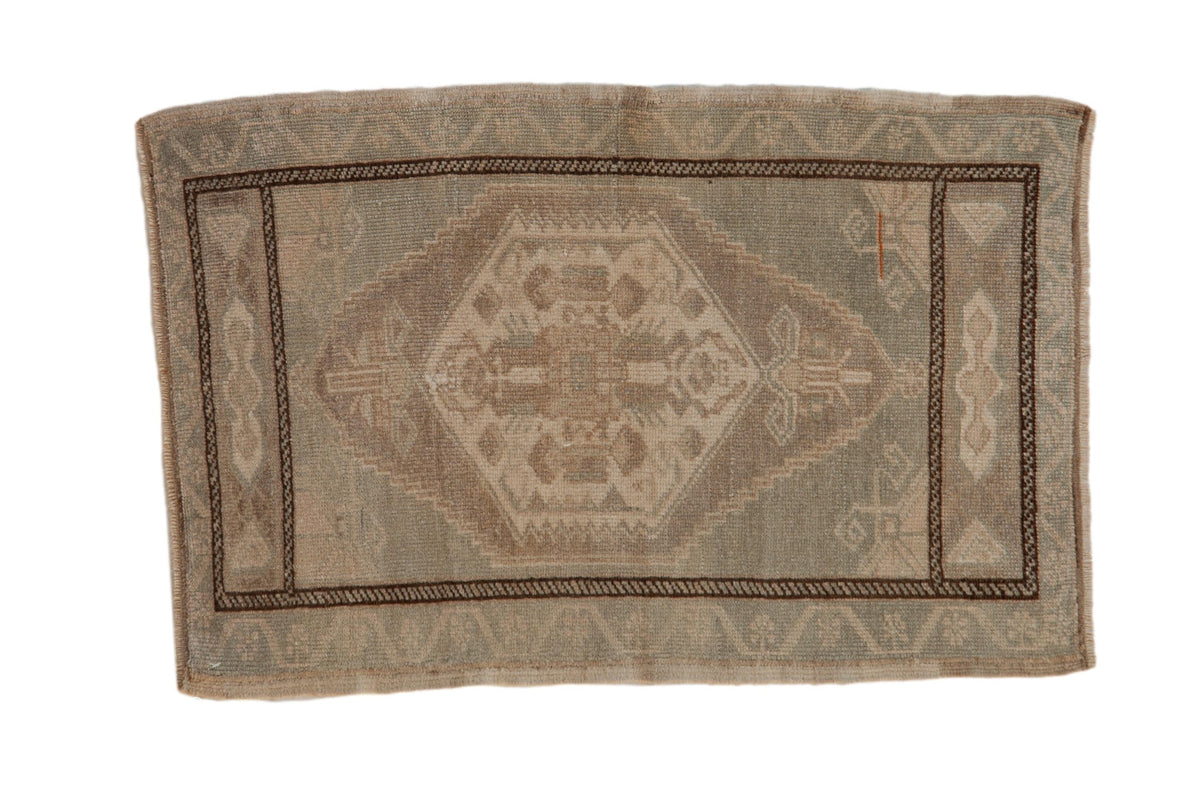 2x3 Vintage Distressed Oushak Rug Mat featuring hexagonal medallion and floral motifs in mauve, seafoam green, ivory, and chocolate brown