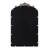 Rectangular black mirror with rounded top and ornate silver decorative element at center top, showing metal clips around edges.