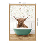 Brown Highland cow with shaggy hair and curved horns sitting in a teal clawfoot bathtub filled with bubbles against floral wallpaper and wood parquet floor.