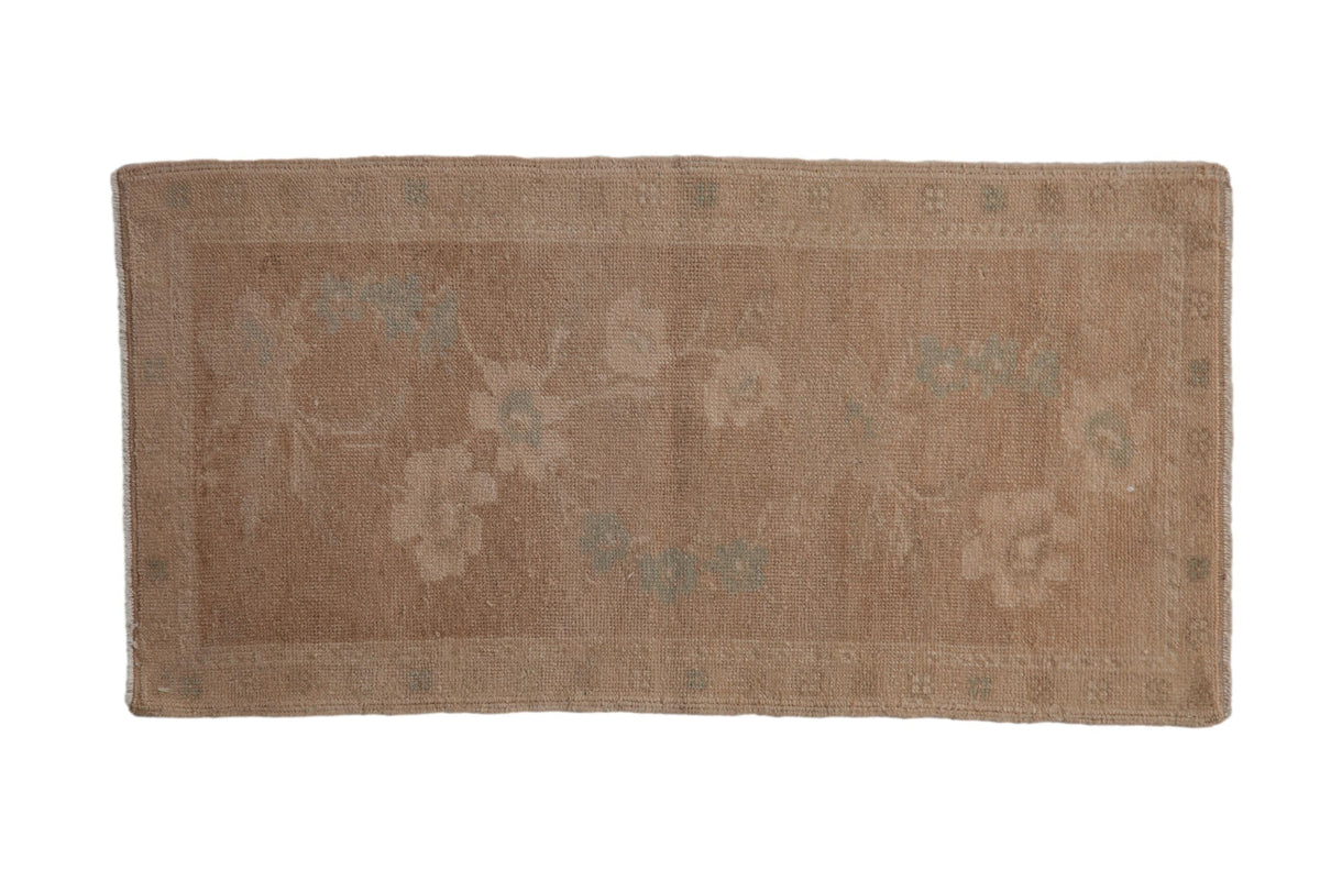 Vintage distressed Oushak rug mat runner with floral blossom vinery pattern in beige and celadon green tones.