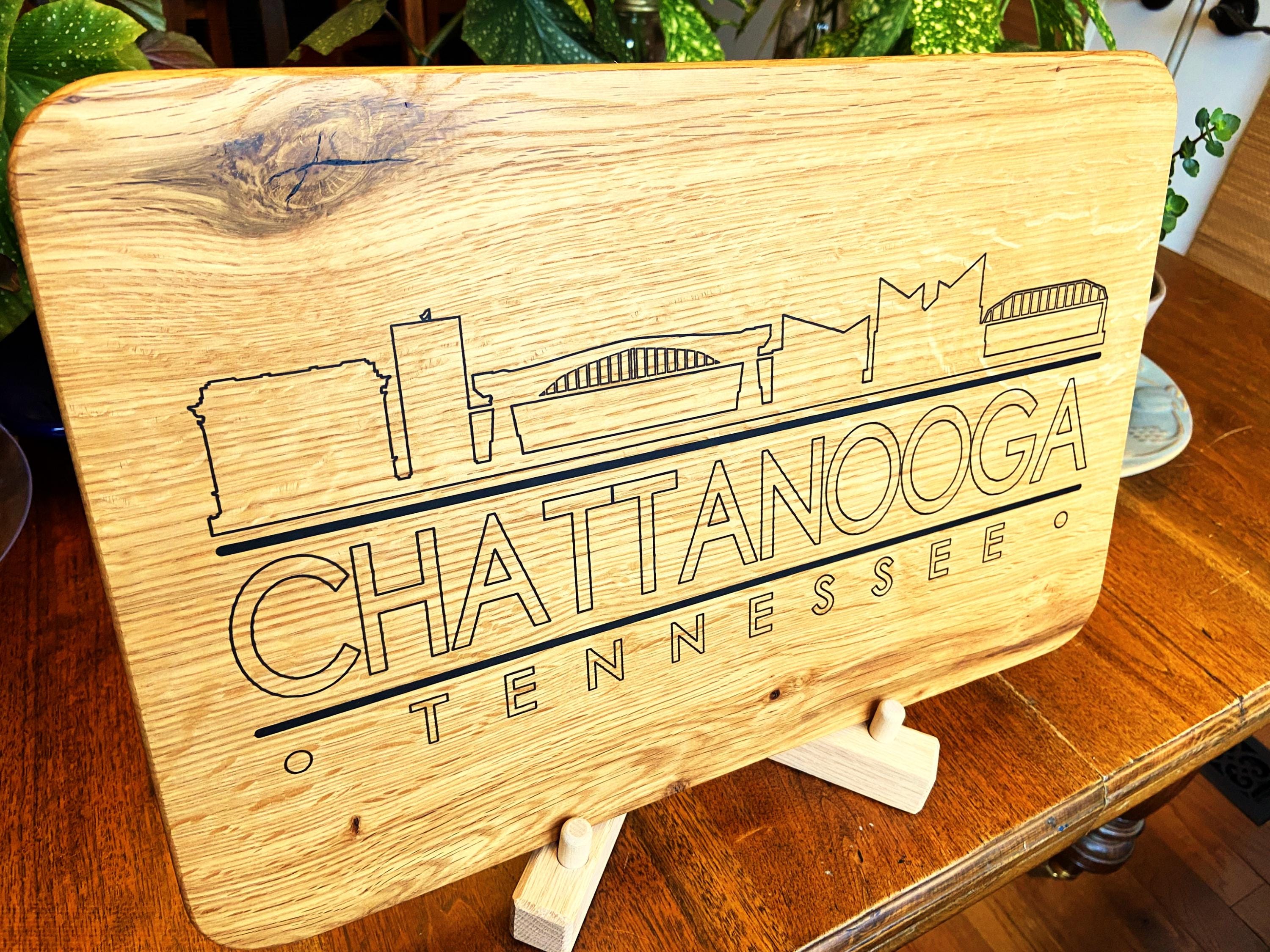Handmade white oak charcuterie board with engraved Chattanooga skyline