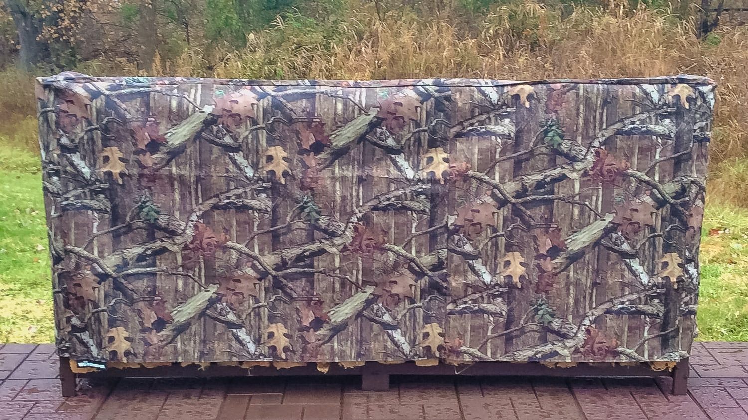 Woodhaven Full Firewood Rack Cover on firewood rack in outdoor setting