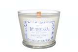 Limited Glass ACK Candle in clear glass container with light flower essence scent
