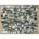 Abstract horizontal canvas with layered rectangular and oval shapes in muted beige, gray, white, and black tones, framed in light wood.