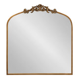 Square wooden-framed arch mirror with an ornamental baroque gold crest at the top center.