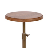Round wooden table top with a warm brown finish on a bronze-toned adjustable metal pedestal base with a locking lever.